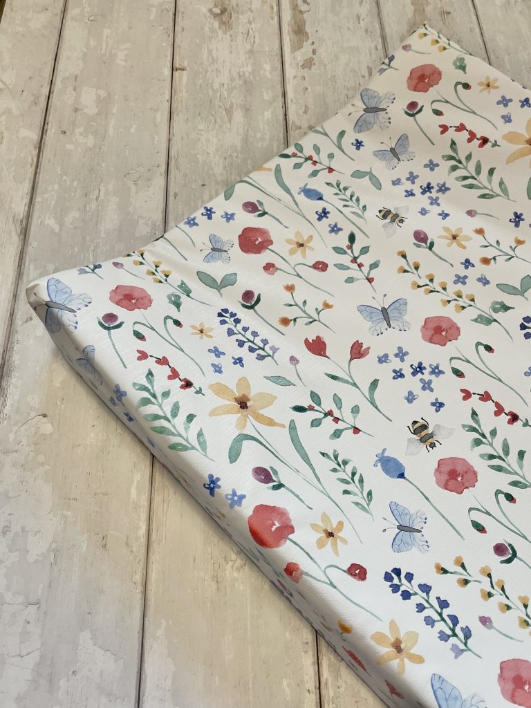 White Flowers and Bee wedge baby changing mat