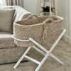 cappuccino crochet moses basket on a white foldable stand